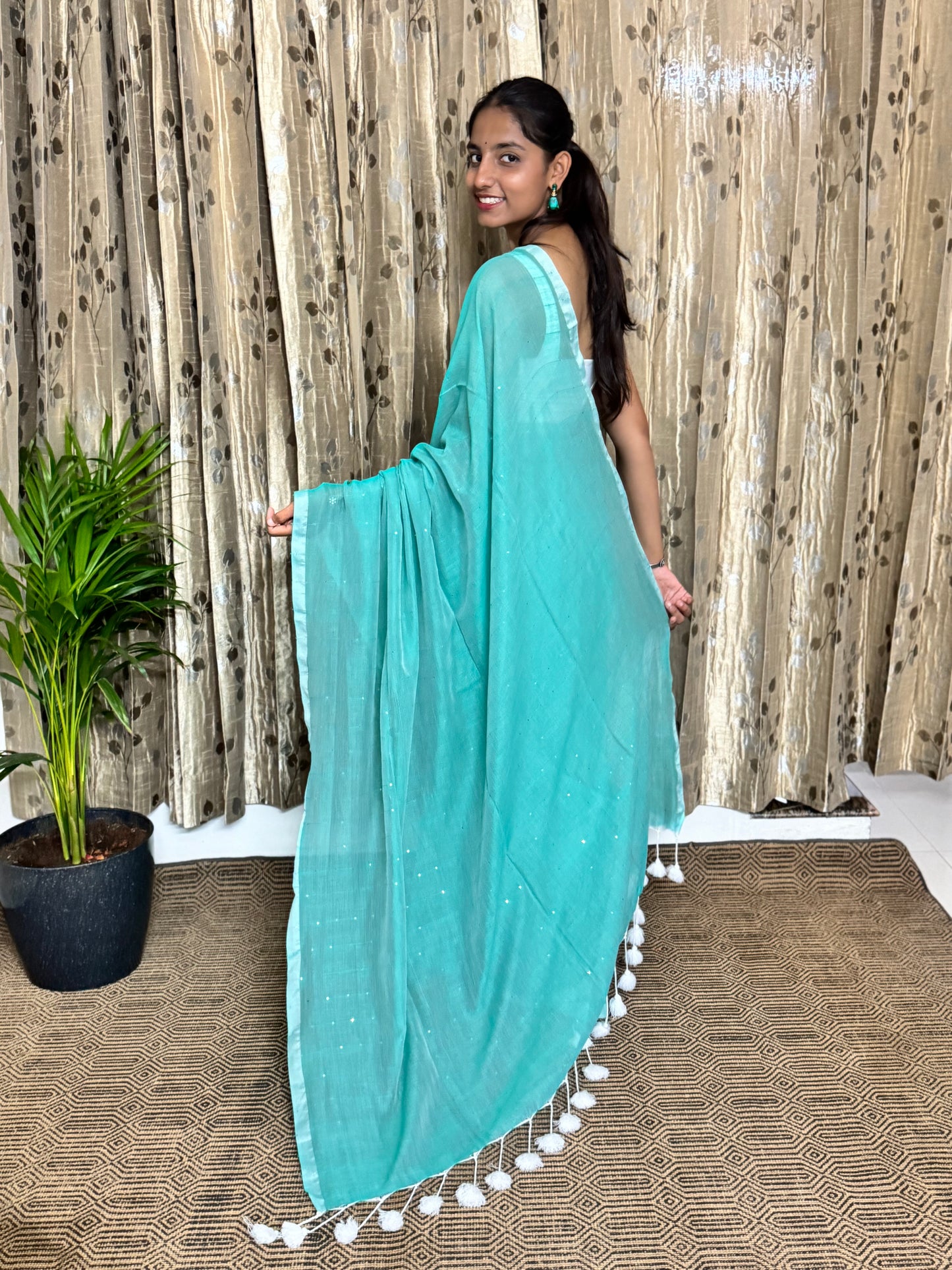 Sea Green Sequin Mul Cotton Saree (length)